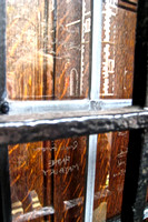Etched names in glass (old 12-pane window)