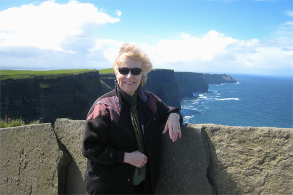 Joyce at windy Cliffs of Moher